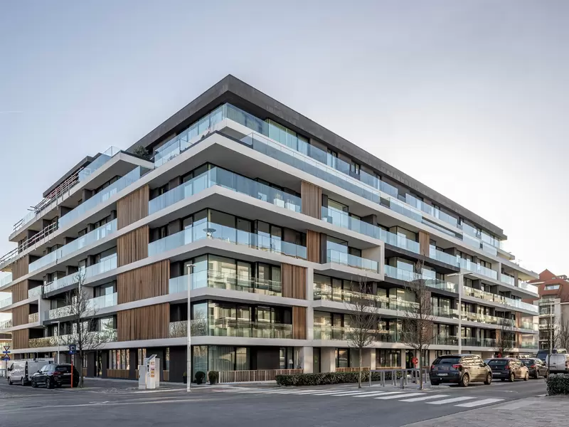 the green white concrete residential building