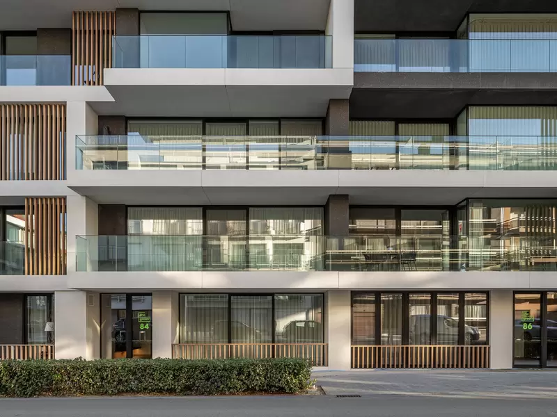 the green white concrete residential building