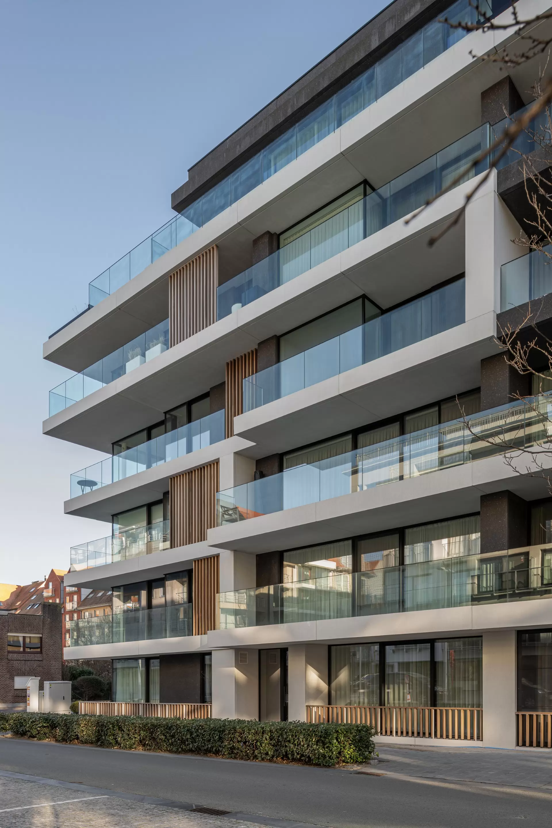 the green white concrete residential building